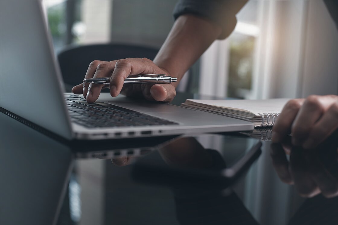 Casual,Business,Man,With,Pen,In,Hand,Busy,Working,On