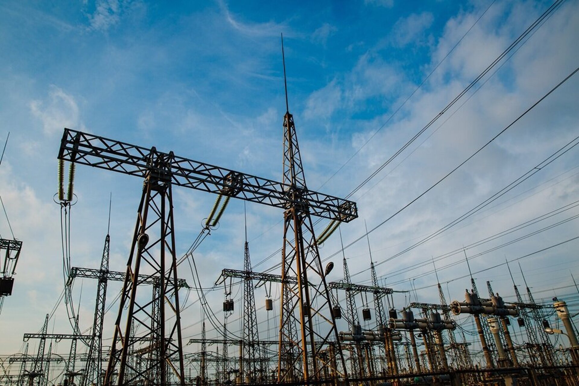 Electrical,Pylons,And,High,Voltage,Power,Lines,Are,Behind,A